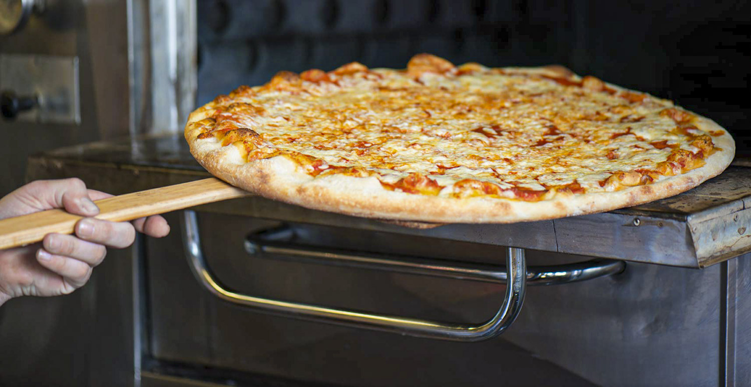 Fresh marinara pizza with basil